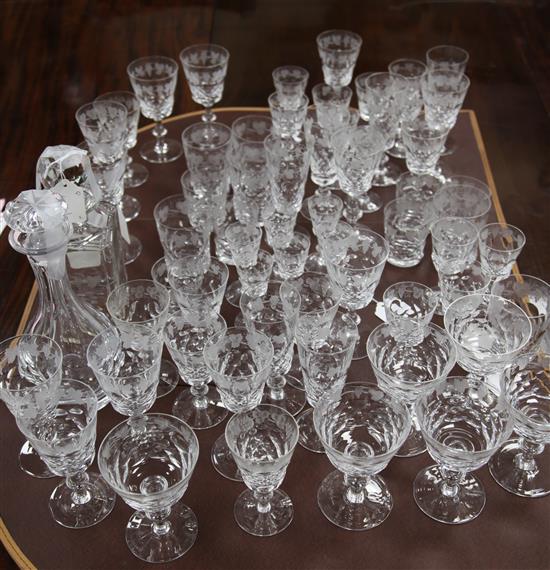 An Edinburgh crystal sixty three piece suite of drinking glasses and a matching decanter and stopper, 20th century